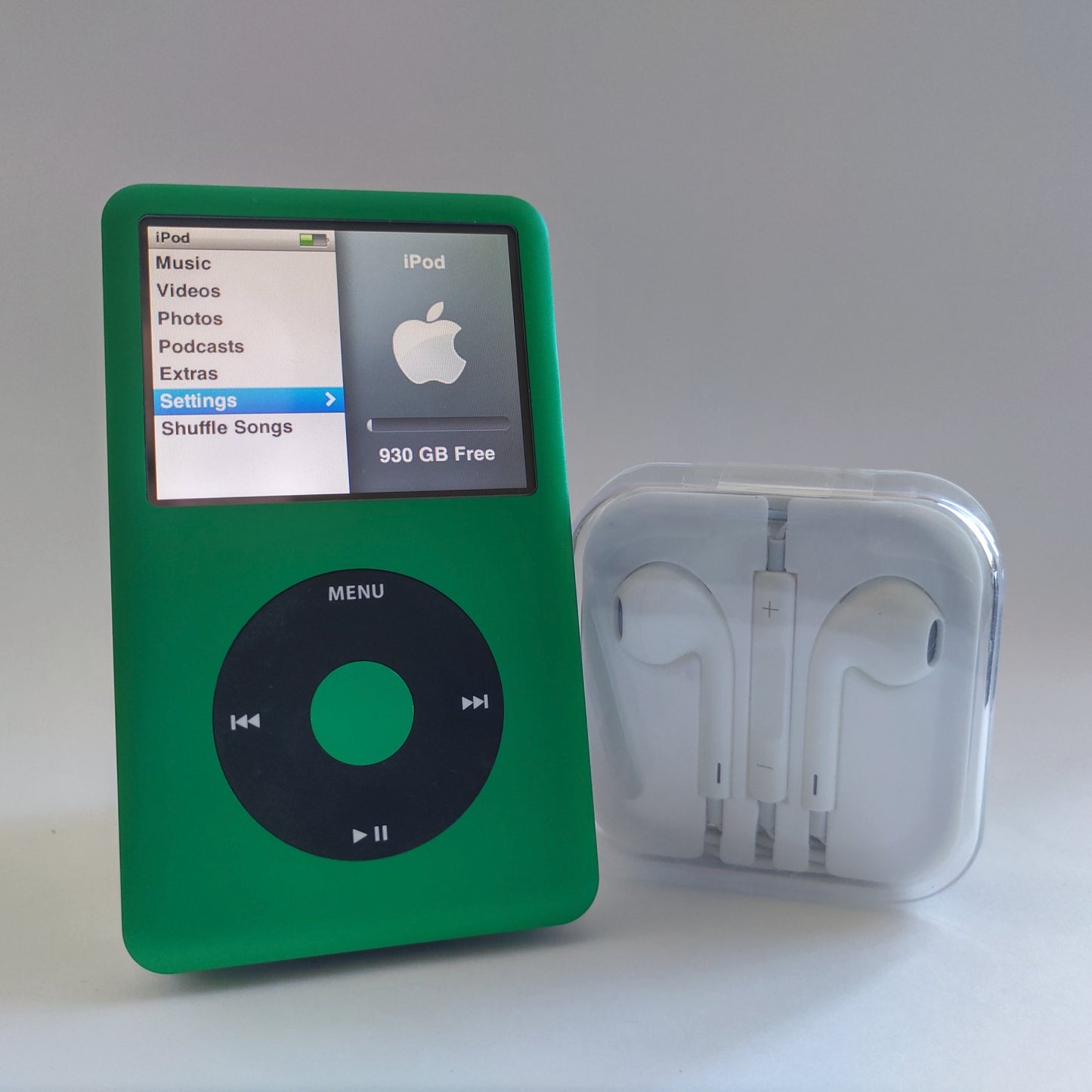 Custom Green iPod classic 1TB with headphones front view