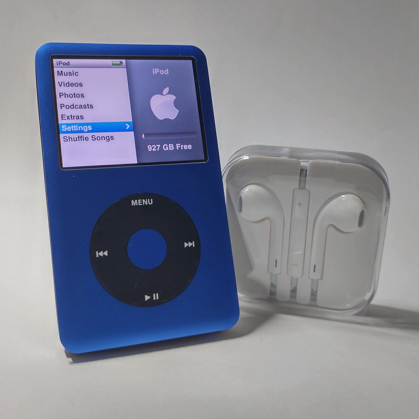 Blue iPod classic with 1TB flash storage front view with headphones