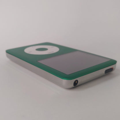 Angled view of a green iPod Classic with a white click wheel and polished silver rear housing