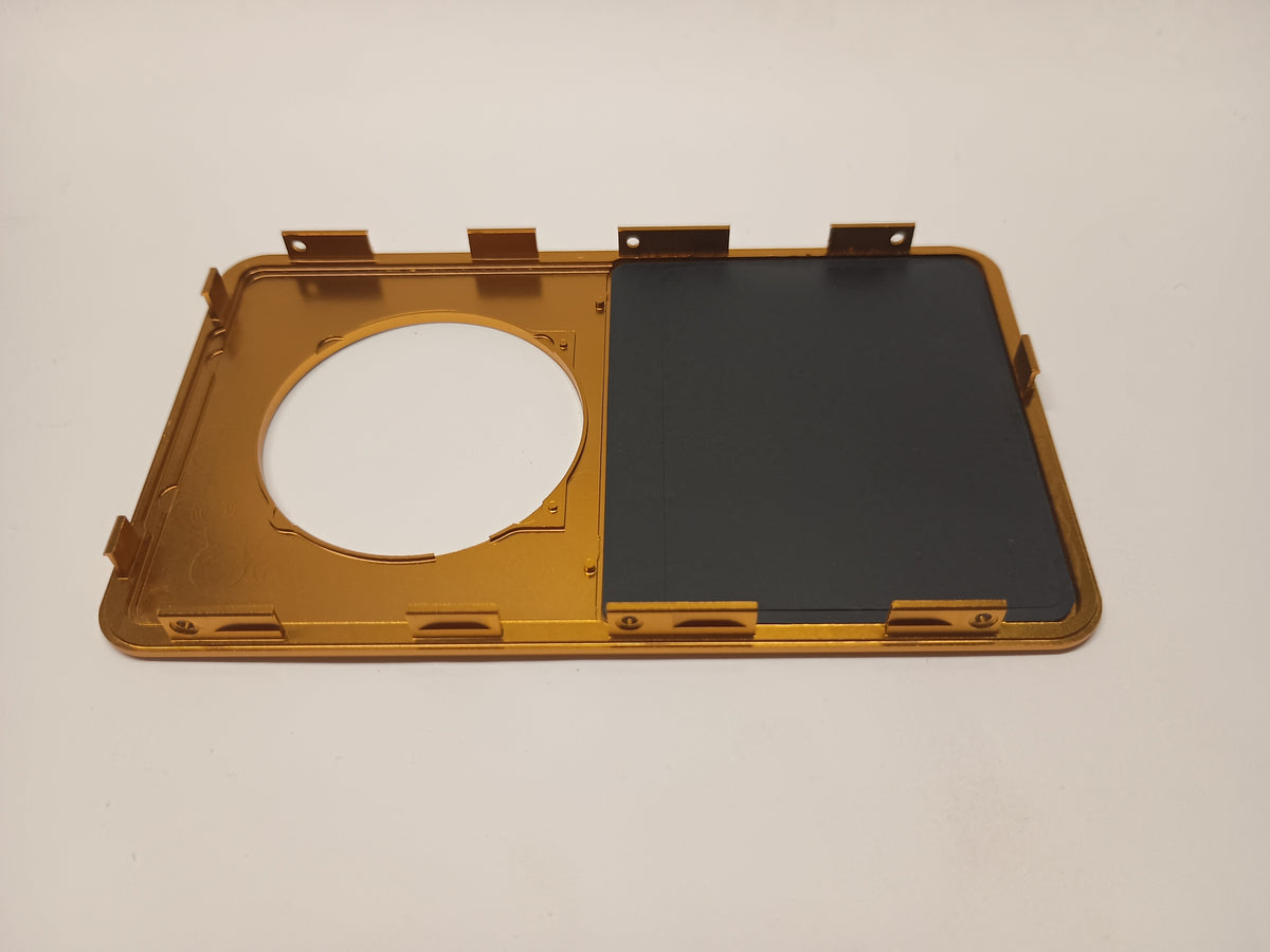 Interior view of a gold iPod Classic replacement front housing with its screen backing and mounting tabs