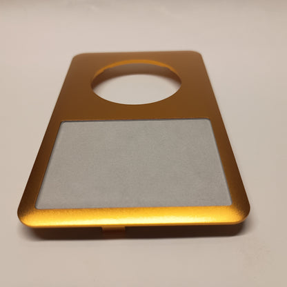 Gold iPod Classic replacement front housing, viewed from the screen end at a low angle