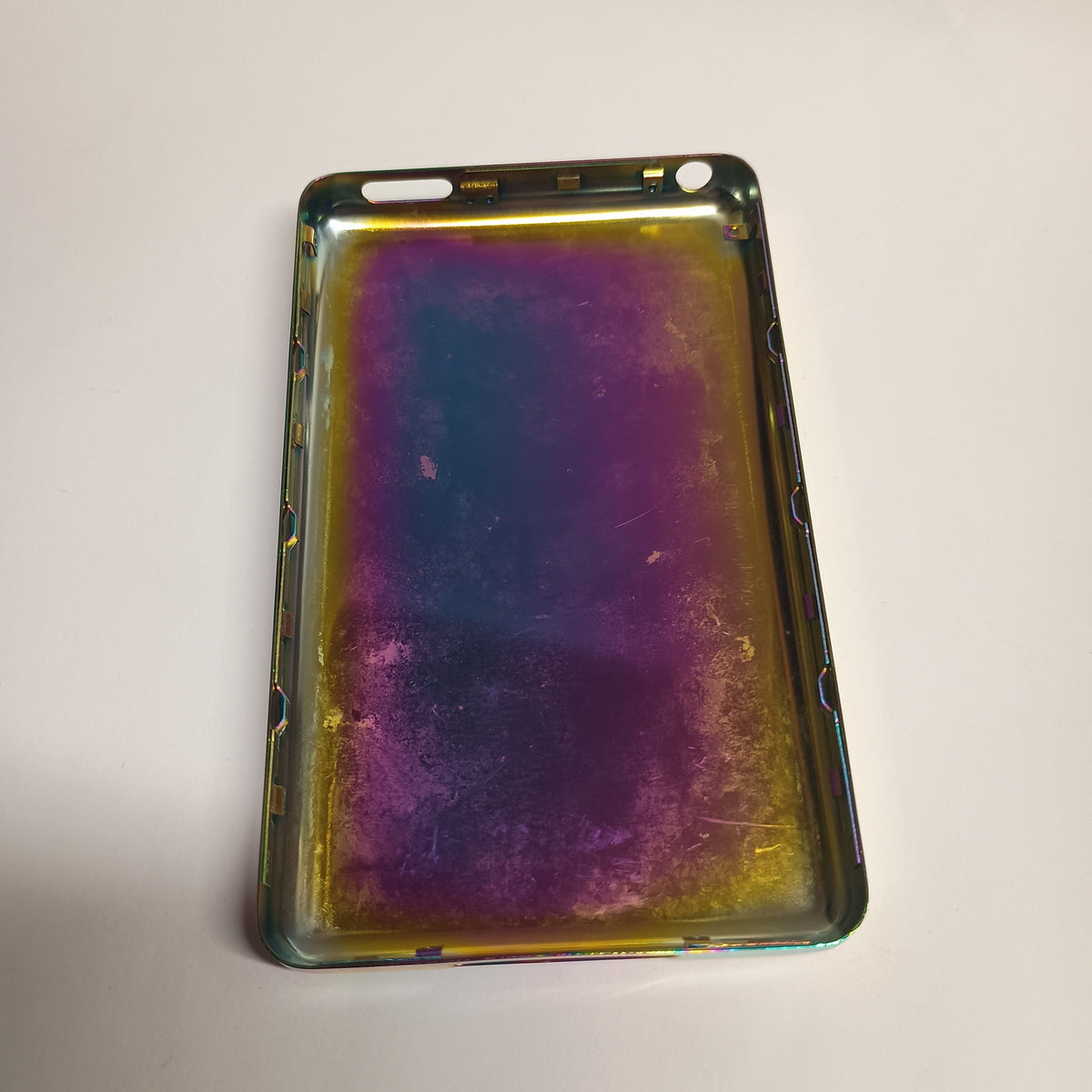Interior view of a rainbow-finish iPod Classic replacement rear housing