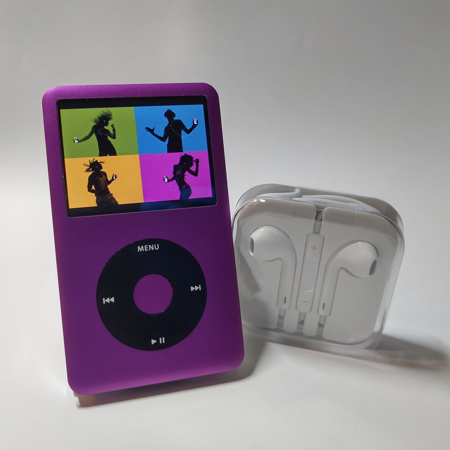 Purple iPod classic front view with headphones